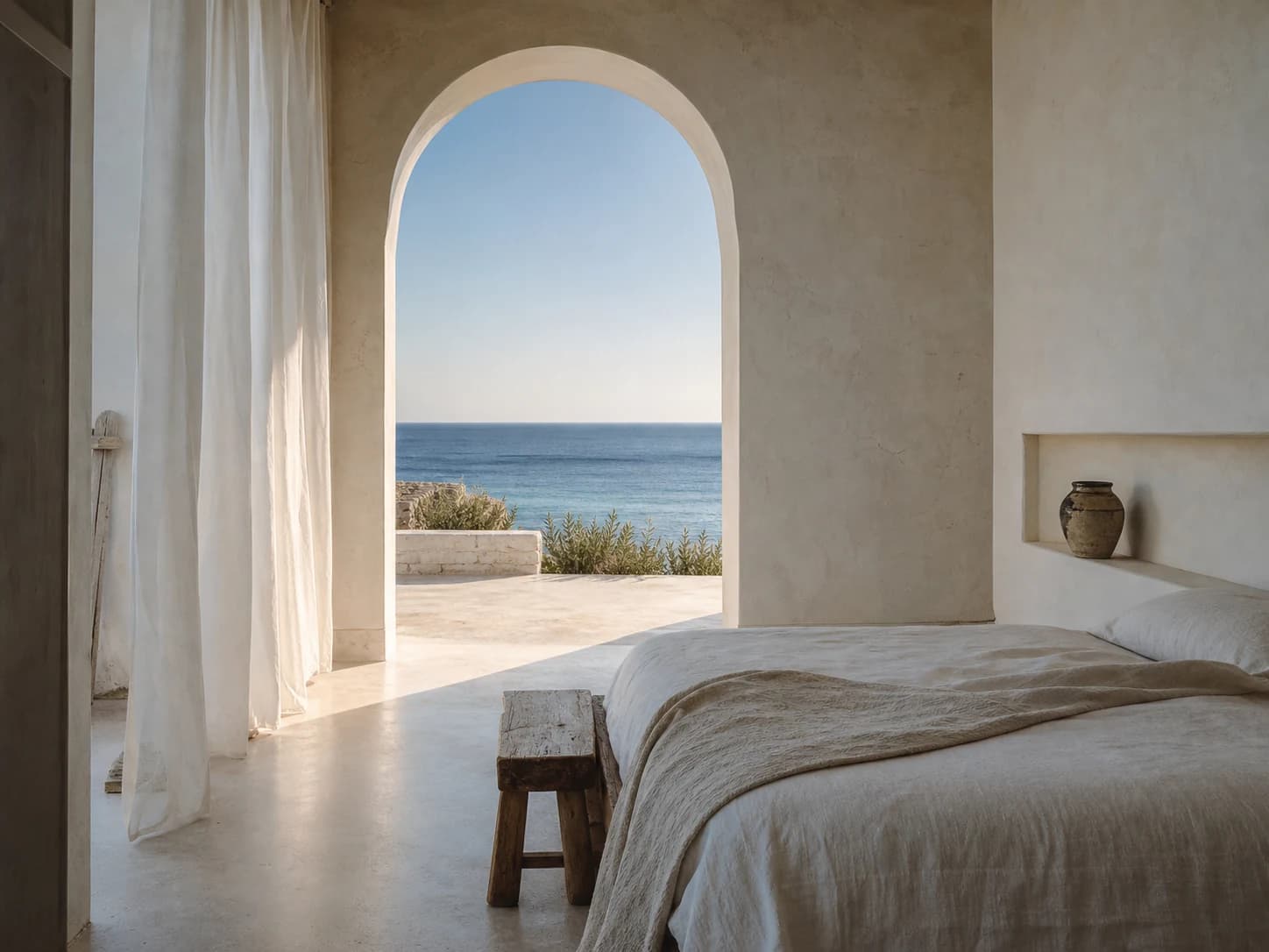 Calm linen guest room facing the sea
